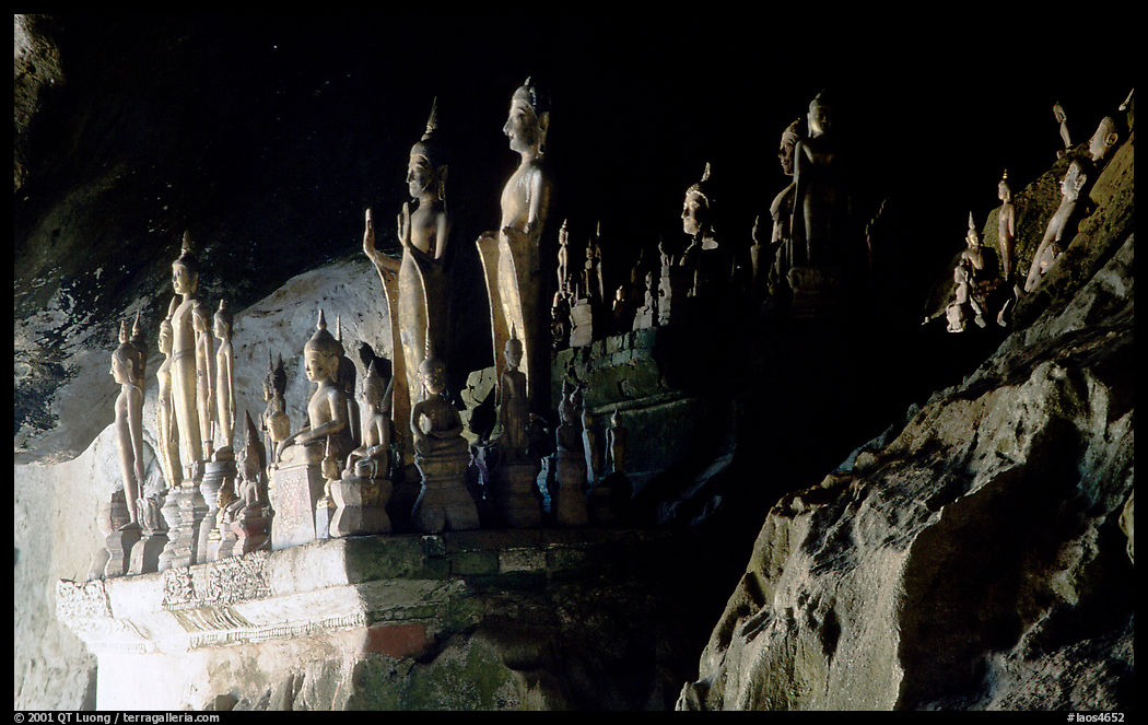 Buddha statues left by pilgrims in Pak Ou caves. Laos