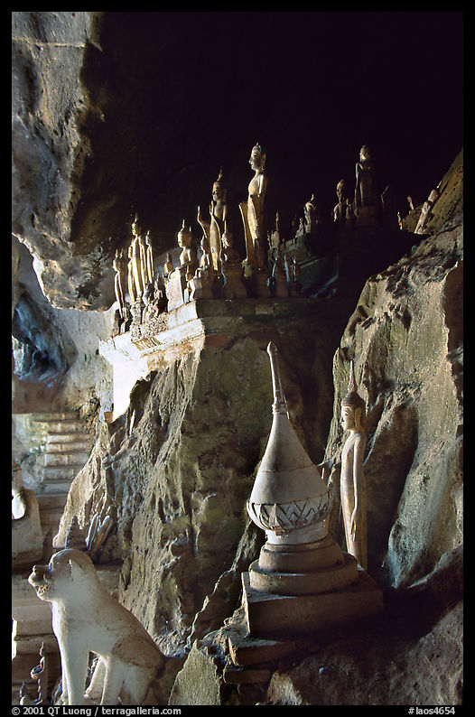 Buddha statues left by pilgrims in Pak Ou caves. Laos