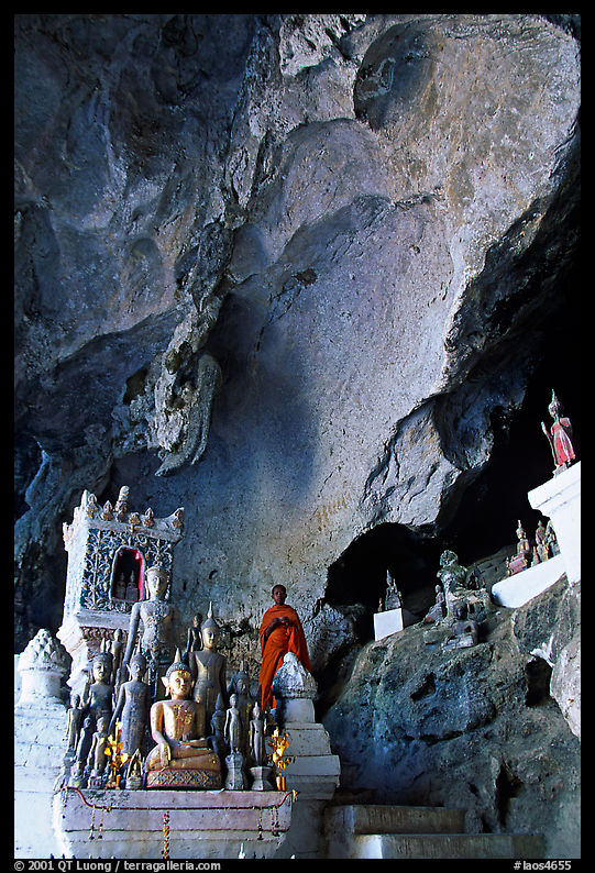 Novice Buddhist monk in Pak Ou cave. Laos