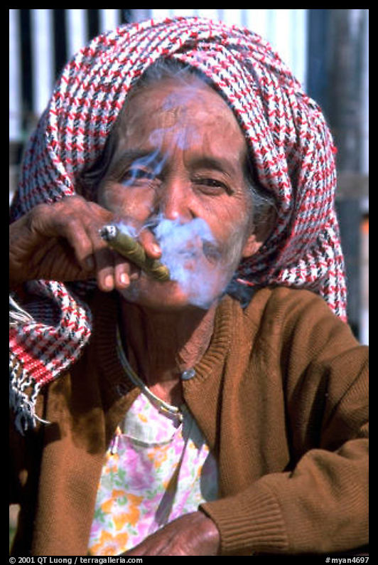Woman smoking a cheerot,  Kalaw. Shan state, Myanmar