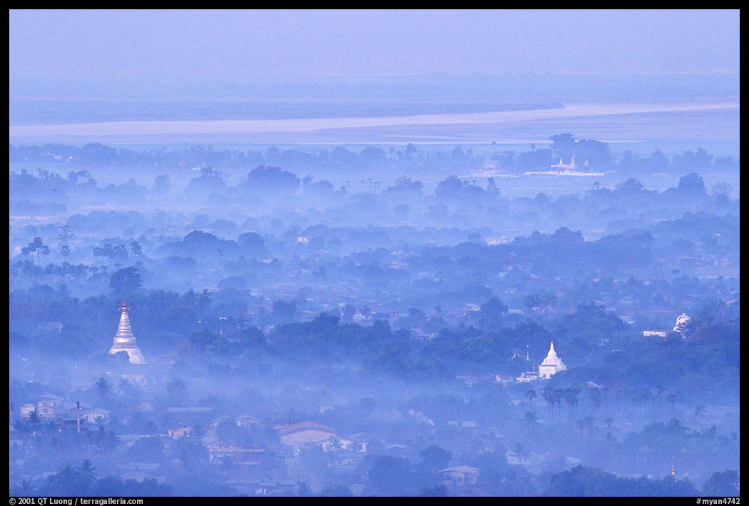 View from the hill through dawn mist. Mandalay, Myanmar