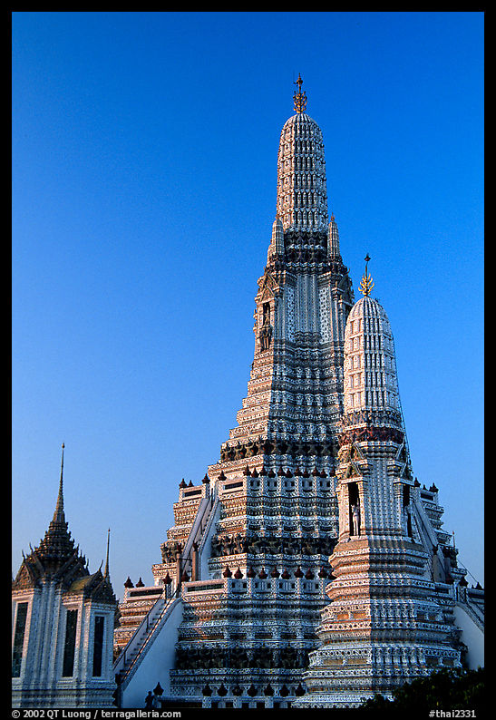Prang (khmer style tower) of the Wat Arun at sunrise. Bangkok, Thailand