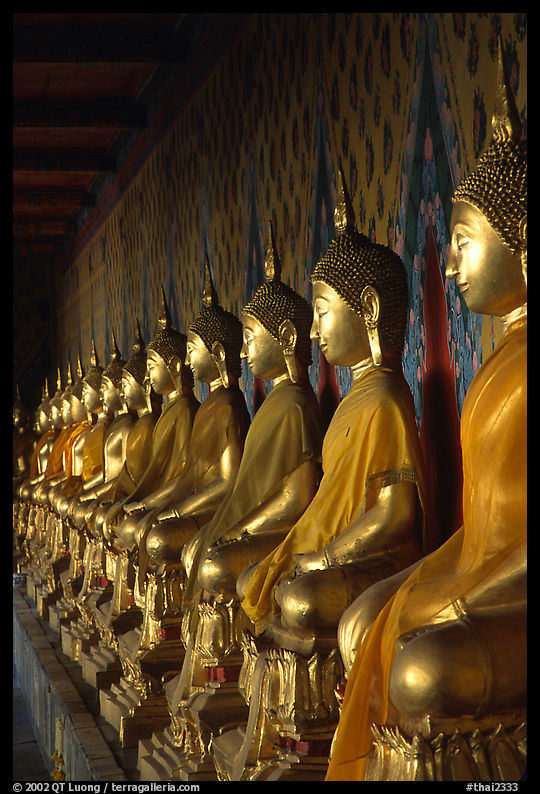 Monks in the inside gallery, Wat Arun. Bangkok, Thailand