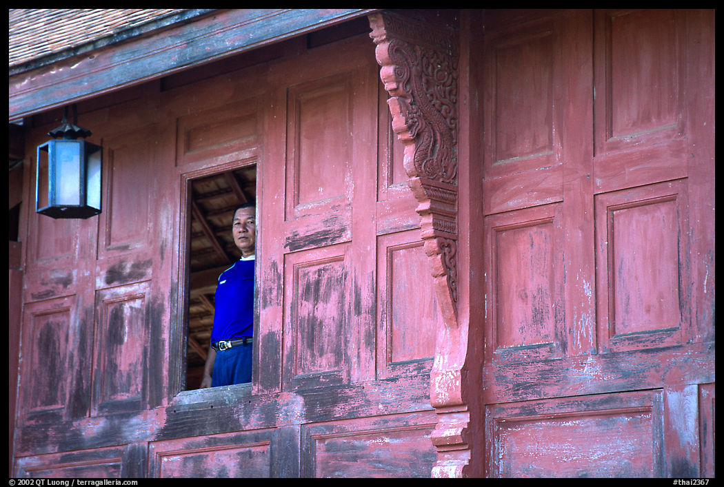 Man at window. Muang Boran, Thailand