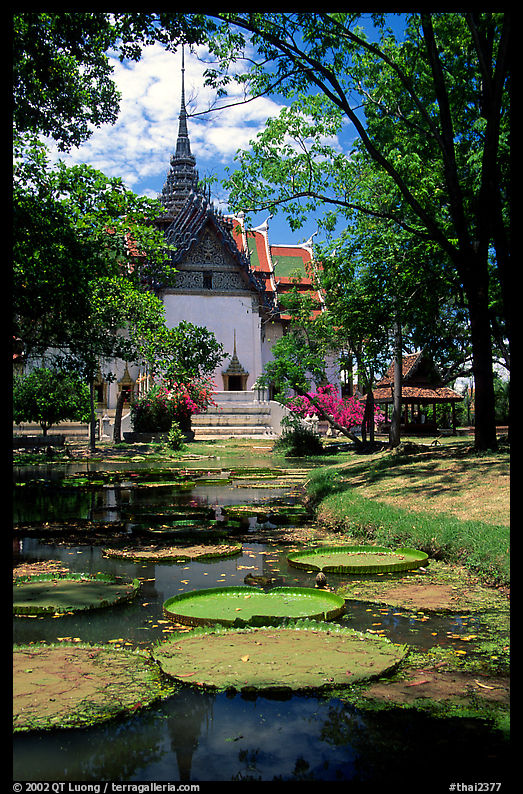 Lotus pond and Ayuthaya-style temple. Muang Boran, Thailand