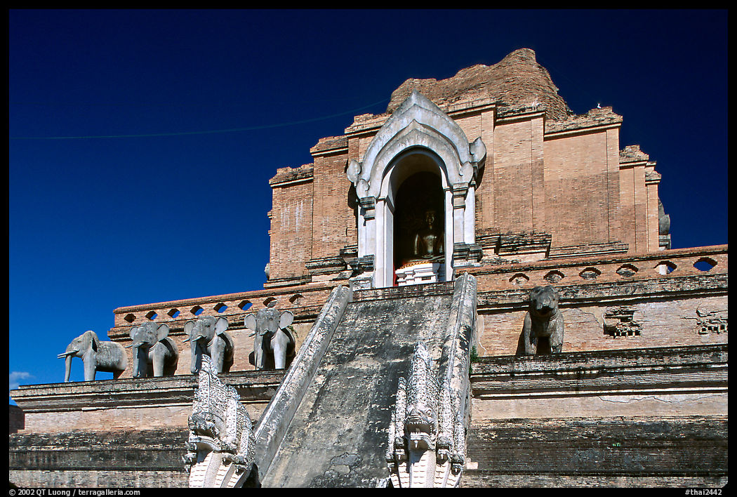 Ruined Wat Chedi Luang with elephants in the pediment. Chiang Mai, Thailand