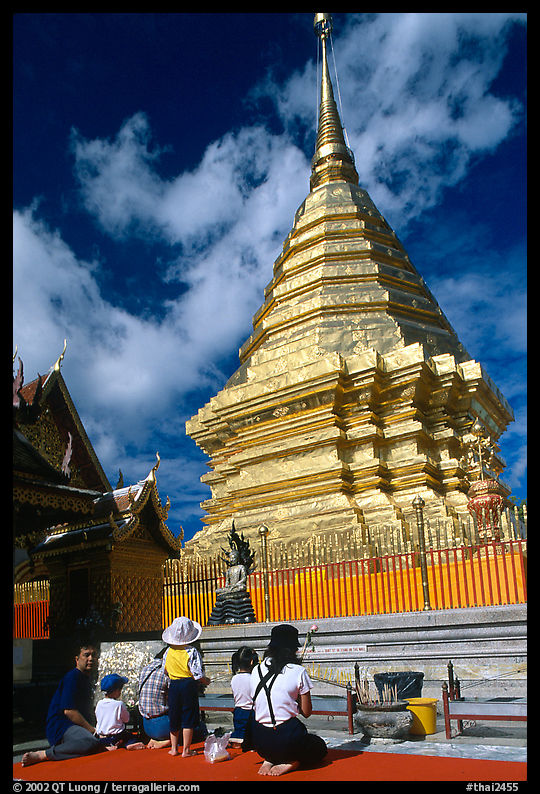 Worshipers at the Chedi of Wat Phra That Doi Suthep. Chiang Mai area, Thailand