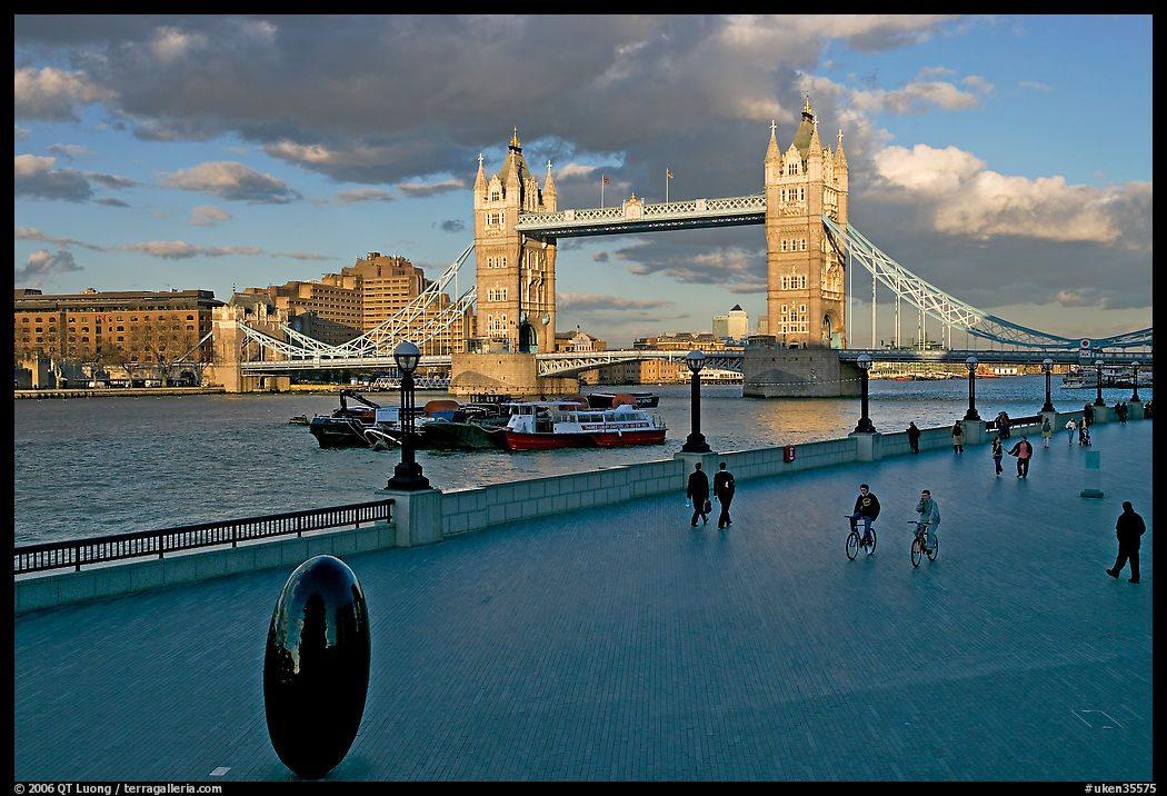 Waterfront promenade in the more London development and Tower Bridge, late afternoon. London, England, United Kingdom