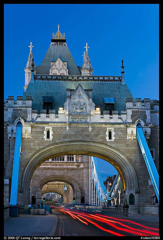 Traffic light trails on Tower Bridge, dusk. London, England, United Kingdom