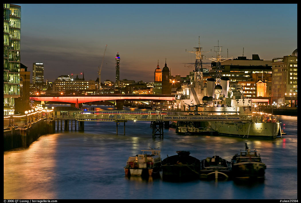 HMS Belfast, London Bridge, and Thames at night. London, England, United Kingdom