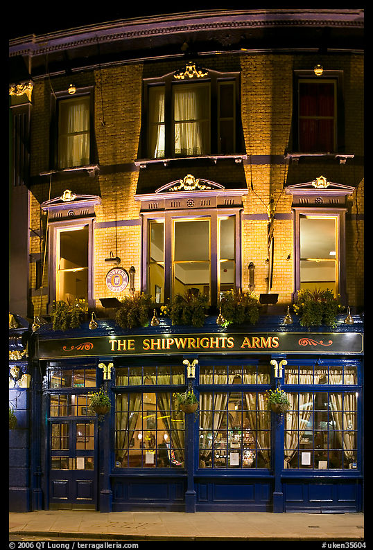Building housing the pub Shipwrights Arms at night. London, England, United Kingdom