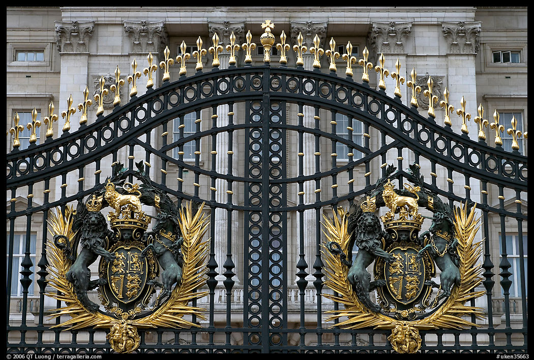 Entrance grids of Buckingham Palace with royalty emblems. London, England, United Kingdom