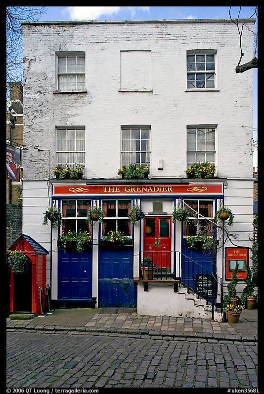 Pub the Grenadier, and cobblestone mews. London, England, United Kingdom