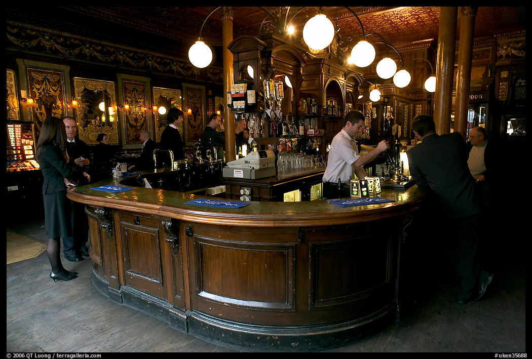 Pouring beer from hand-pulled pump, pub Princess Louise. London, England, United Kingdom