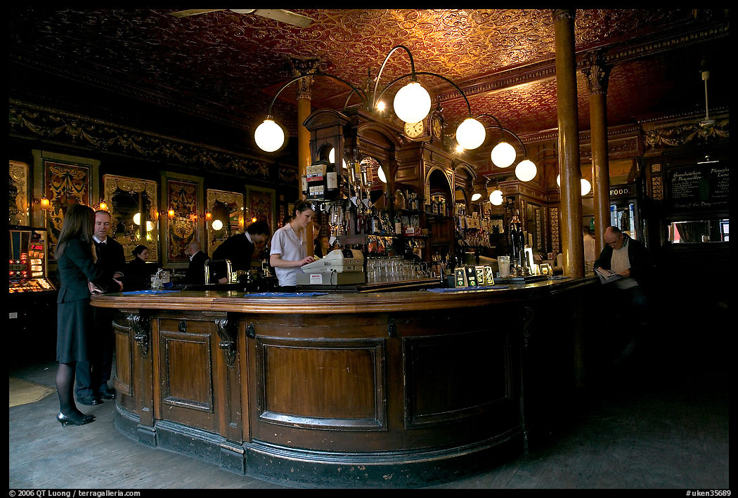 Central horseshoe bar in the 19th century victorian  pub Princess Louise. London, England, United Kingdom