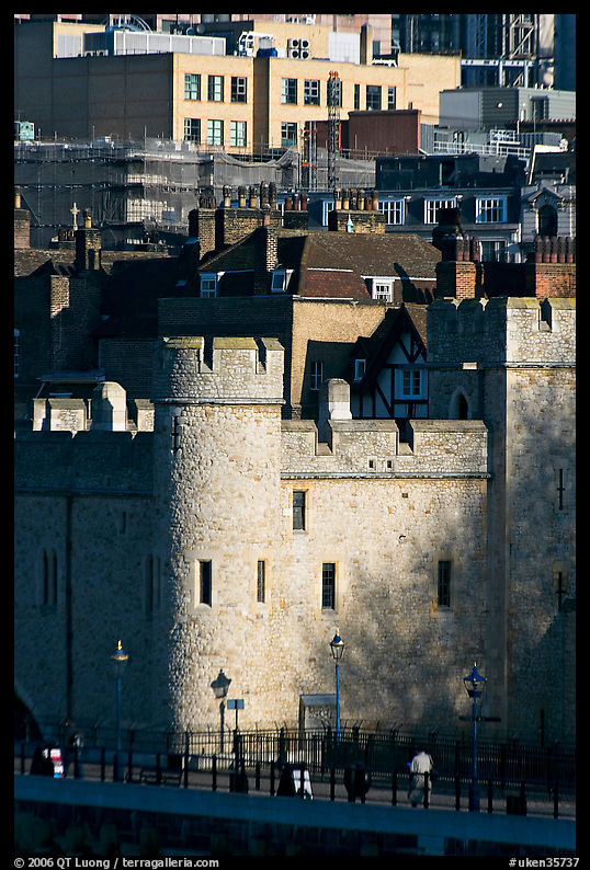 Tower of London and jumble of modern buildings in the background. London, England, United Kingdom
