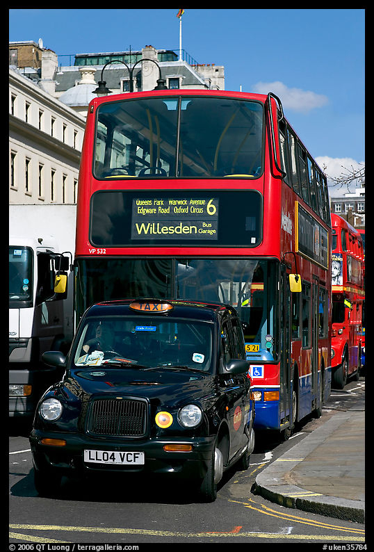 Taxi and double decker bus. London, England, United Kingdom
