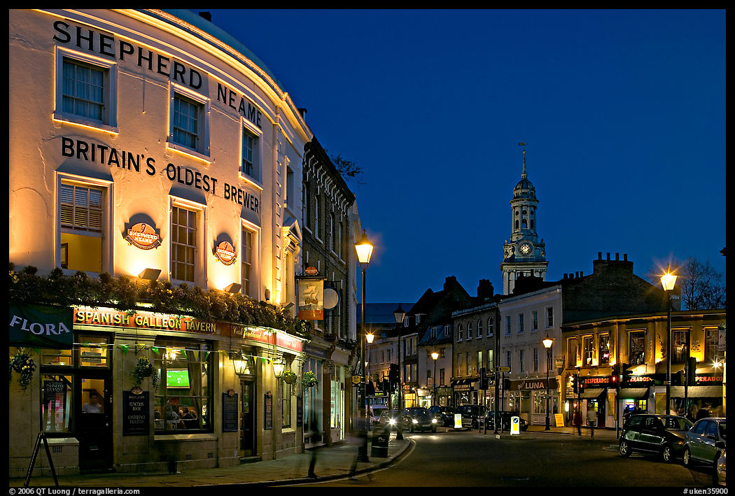 Tavern, street, and church at night. Greenwich, London, England, United Kingdom