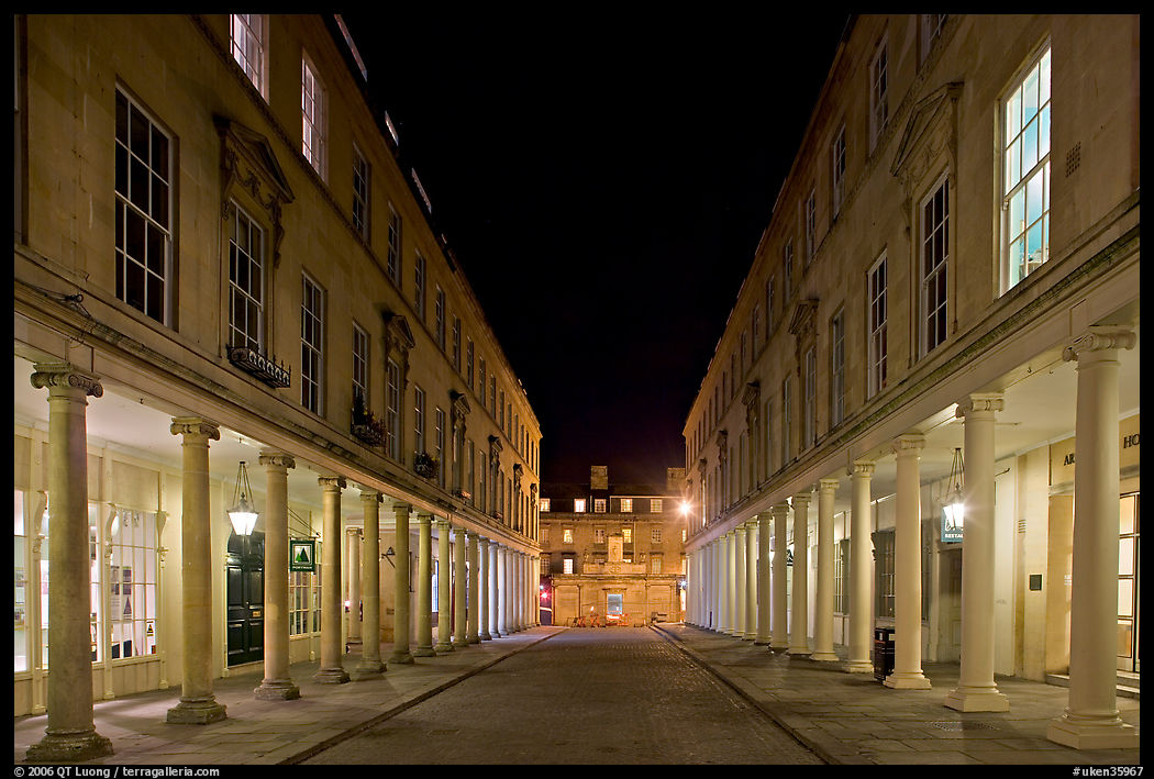 Street bordered by colonades at night. Bath, Somerset, England, United Kingdom