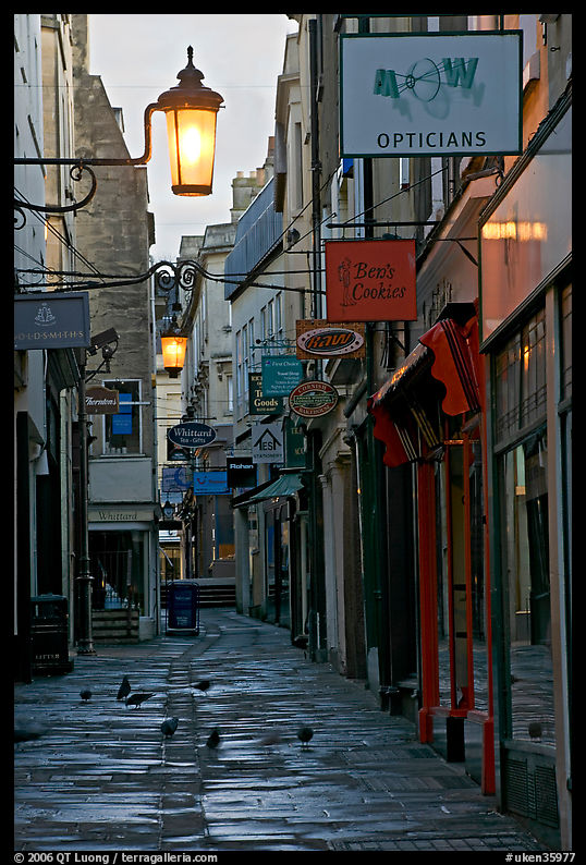 Lamps, pigeons, and narrow street. Bath, Somerset, England, United Kingdom