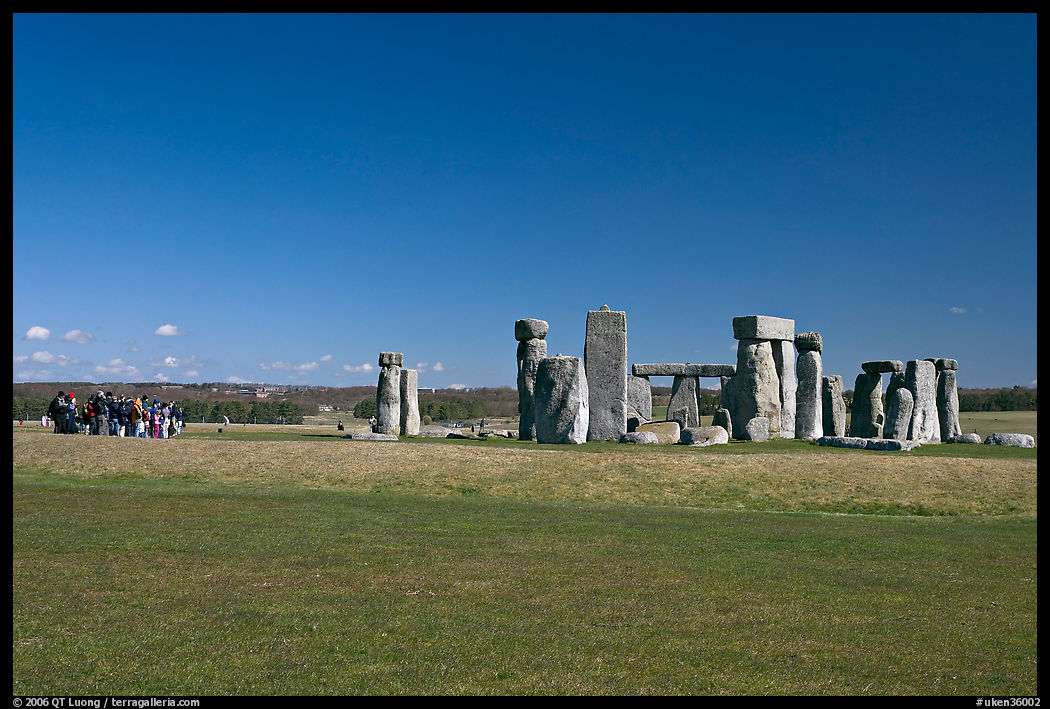Large group of visitors looking at the megaliths, Stonehenge, Salisbury. England, United Kingdom