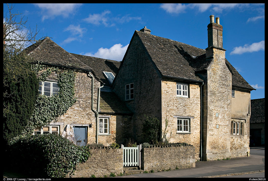 Houses with roofs made from split natural stone tiles, Lacock. Wiltshire, England, United Kingdom