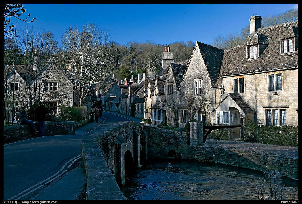 Packbridge crossing the Bybrook River and main street, Castle Combe. Wiltshire, England, United Kingdom
