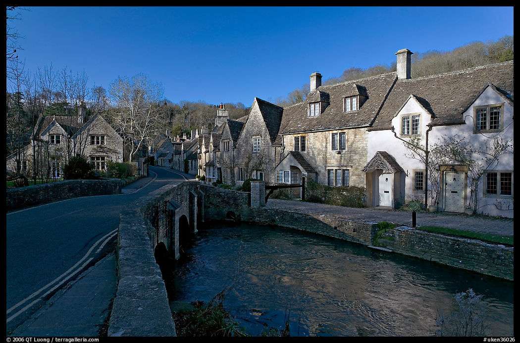 Main village street and Bybrook River, late afternoon, Castle Combe. Wiltshire, England, United Kingdom