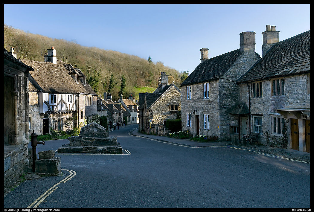 Main village street,  half timbered Court House, and Butter Cross, Castle Combe. Wiltshire, England, United Kingdom