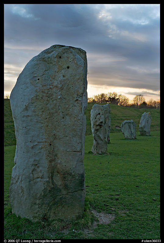 Megaliths forming part of a 348-meter diameter stone circle, sunset, Avebury, Wiltshire. England, United Kingdom