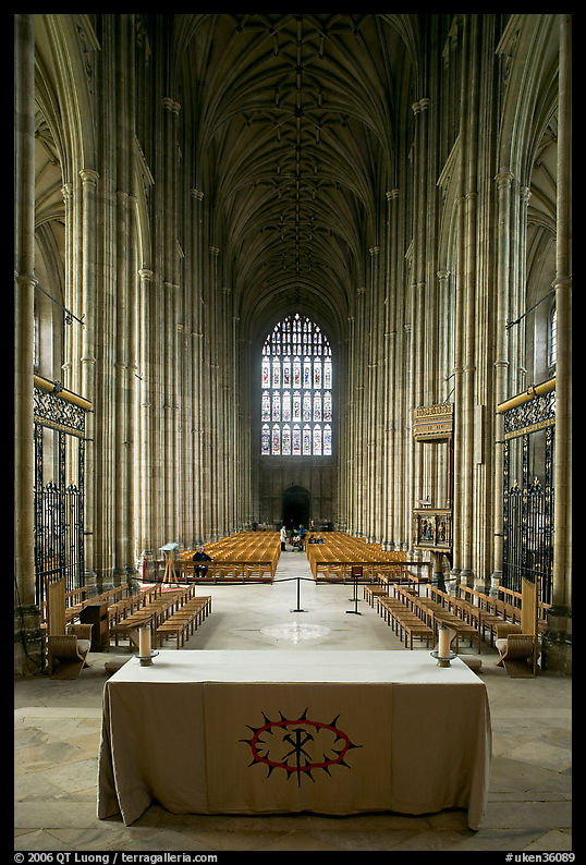 Altar, soaring arches of the Nave, and stained glass, Canterbury Cathedral. Canterbury,  Kent, England, United Kingdom