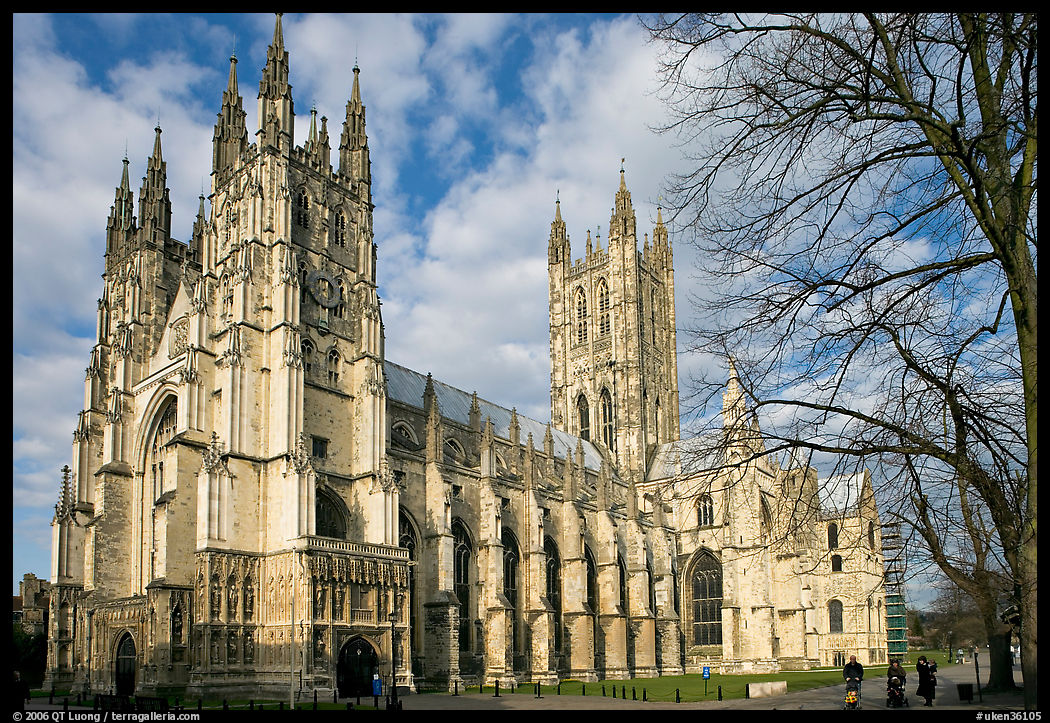 Canterbury Cathedral with people strolling on precincts. Canterbury,  Kent, England, United Kingdom