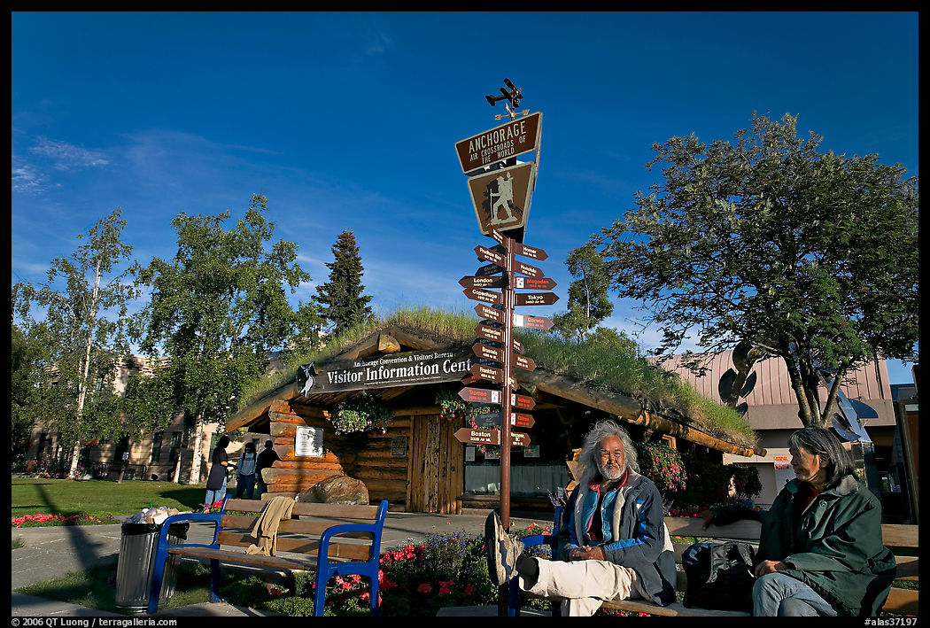 Native people sitting in front of visitor center. Anchorage, Alaska, USA
