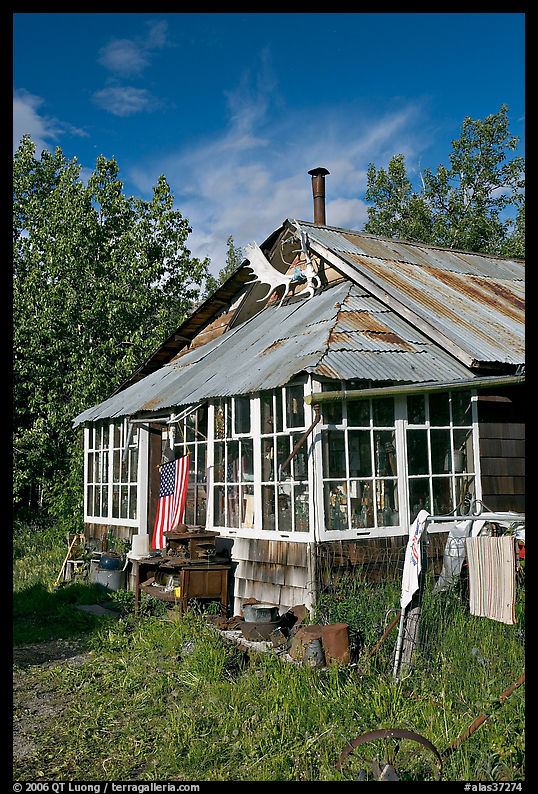 House with antlers and american flag. McCarthy, USA