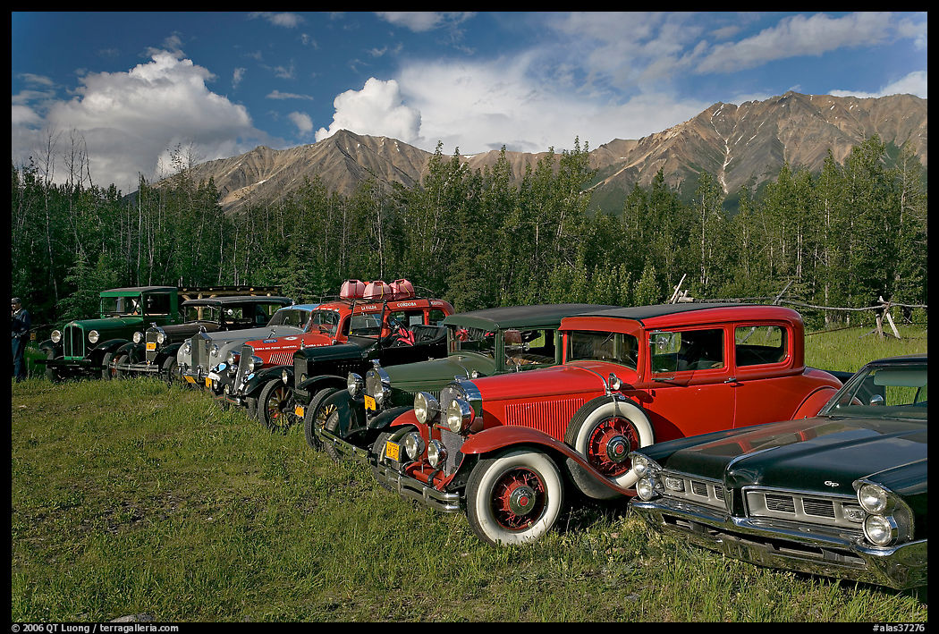 Vintage cars lined up in meadow. McCarthy, USA