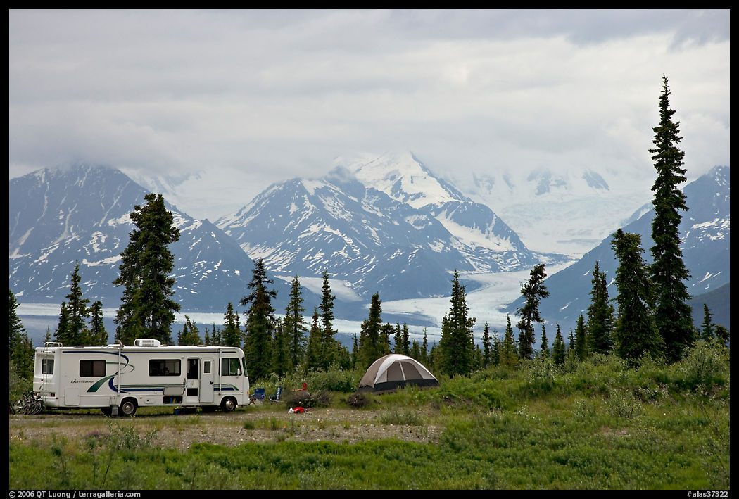 RV, tent, with glacier and mountains in background. Glenn Highway, Central Alaska, USA