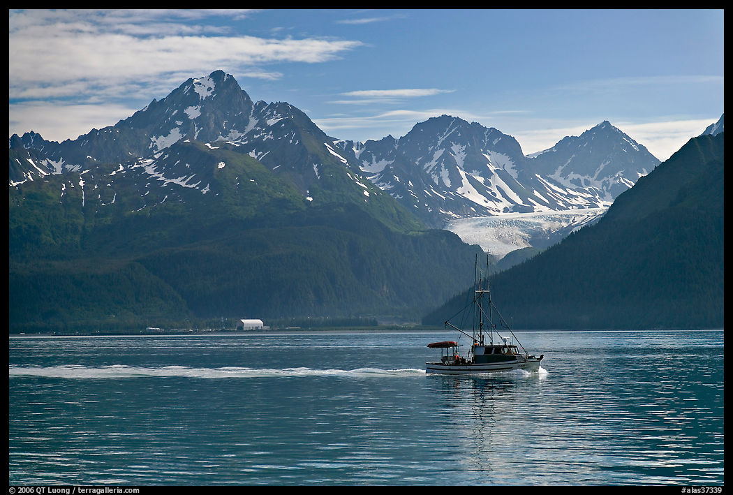 Fishing boat, mountains and glaciers. Seward, Kenai Peninsula, Alaska, USA