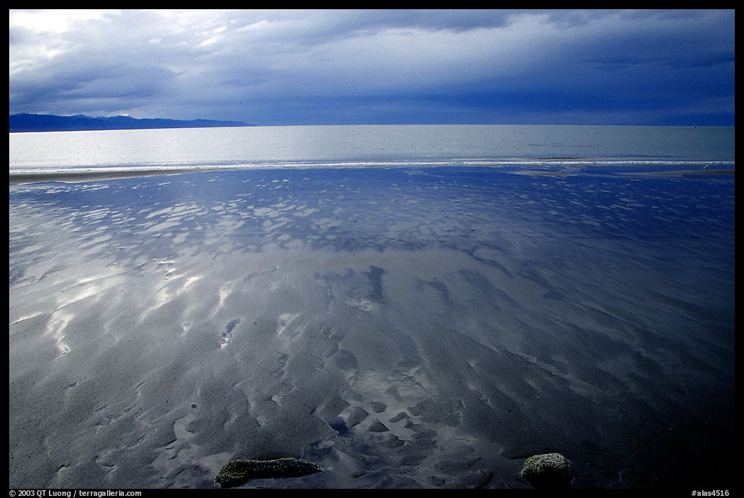 Sand patterns and stormy skies on the Bay. Homer, Kenai Peninsula, Alaska, USA