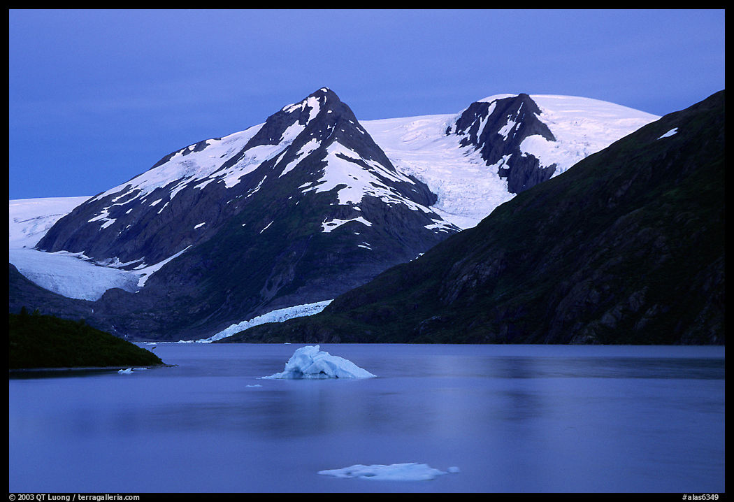 Icebergs in Portage Lake at dusk. Alaska, USA