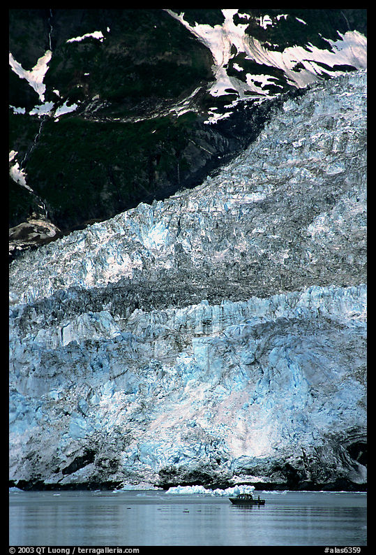 Boat at the base of Barry Glacier. Prince William Sound, Alaska, USA
