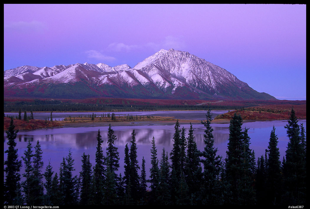 Purple mountains and lake at dusk. Denali Highway, Central Alaska, USA