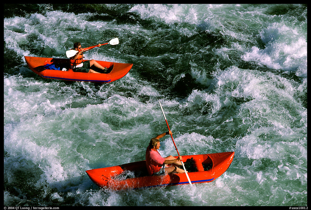 Kayakers on the rapids of the Trinity River, Shasta Trinity National Forest. California, USA