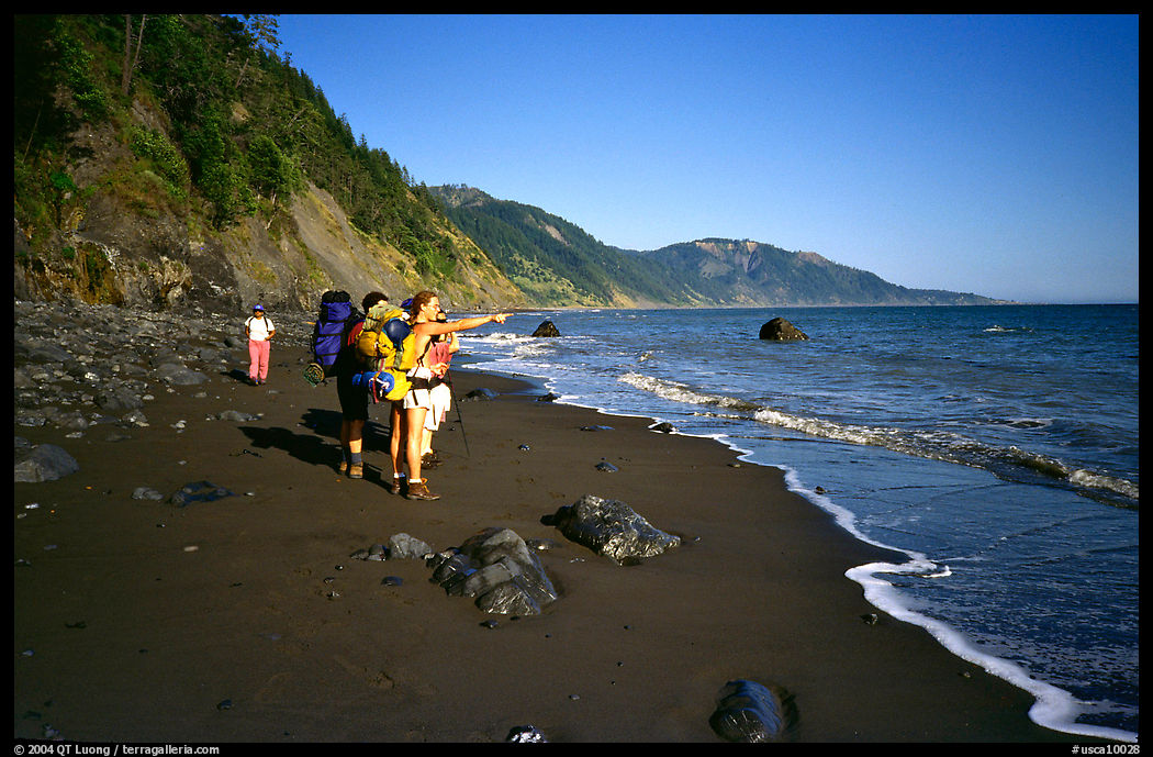 Backpackers on the beach,  Lost Coast. California, USA