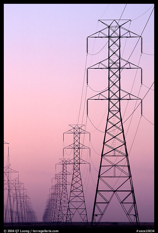 High tension power lines at dusk. California, USA