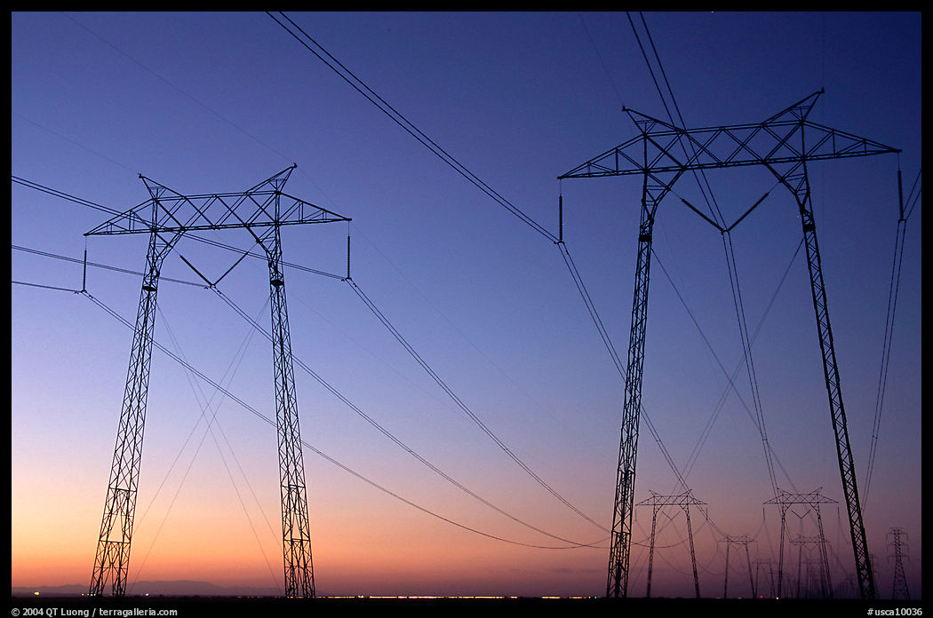 High tension power lines at sunset. California, USA
