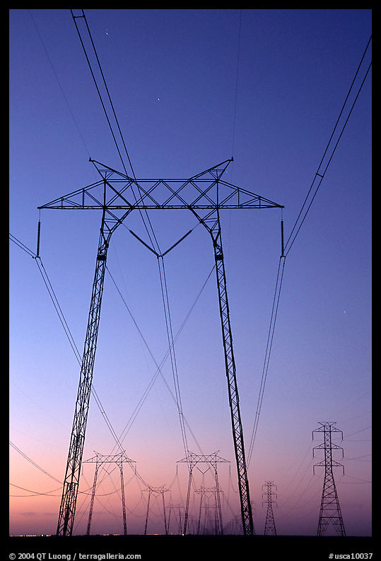 High voltage power lines at sunset. California, USA
