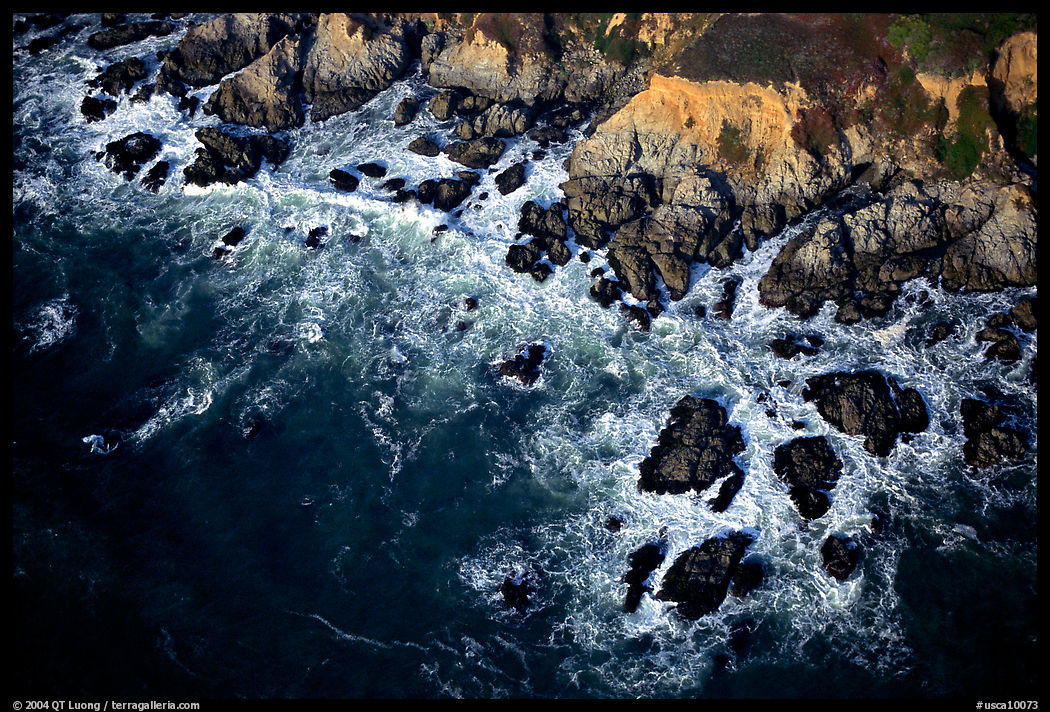 Aerial view of surf and rock. San Mateo County, California, USA