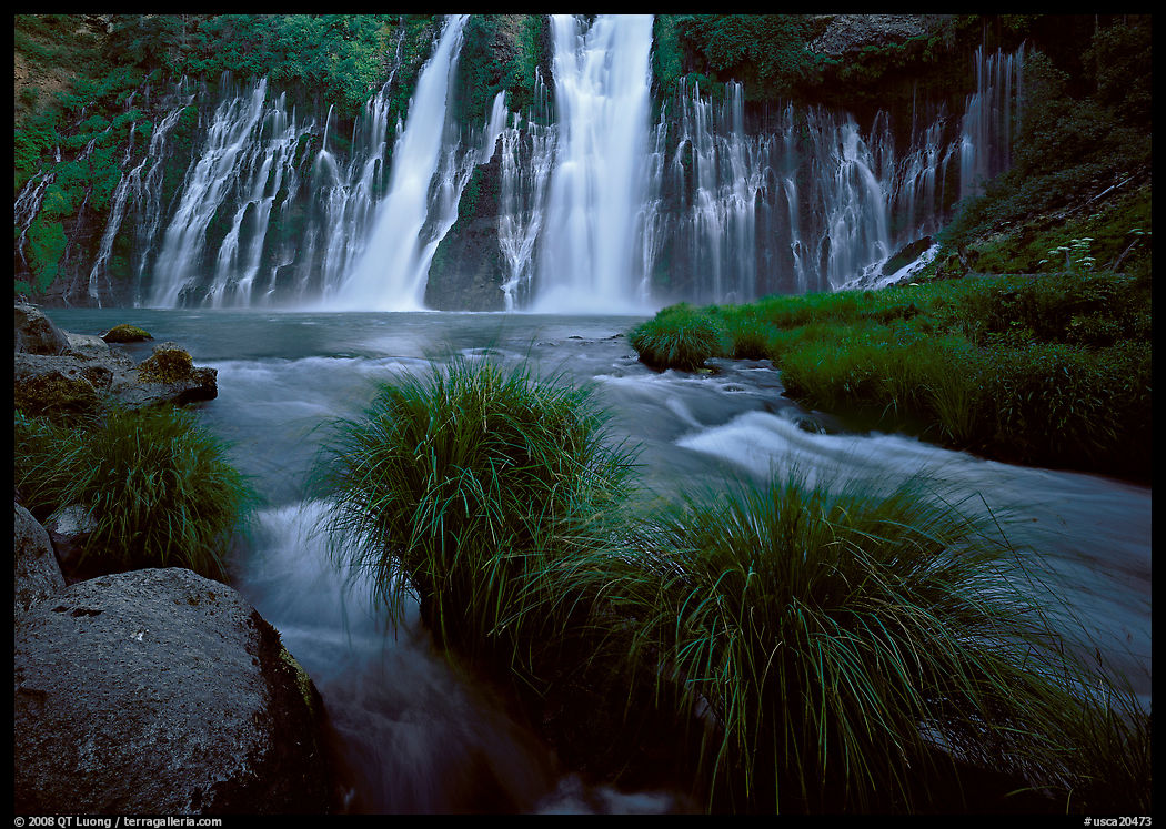 Grasses, stream and wide waterfall, Burney Falls State Park. California, USA