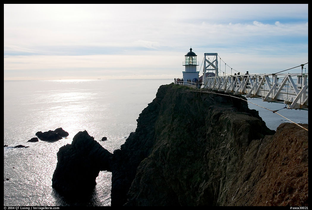 Narrow bridge leading to the Point Bonita Lighthouse, afternoon. SF Bay area, California, USA