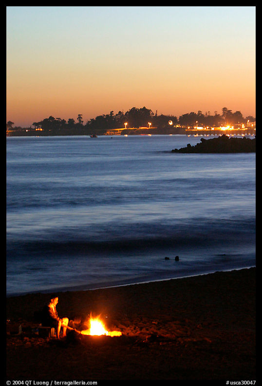 Bonfire on the beach at sunset. Santa Cruz, California, USA